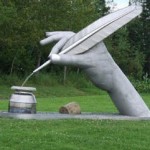 statue-hand-writing-pen